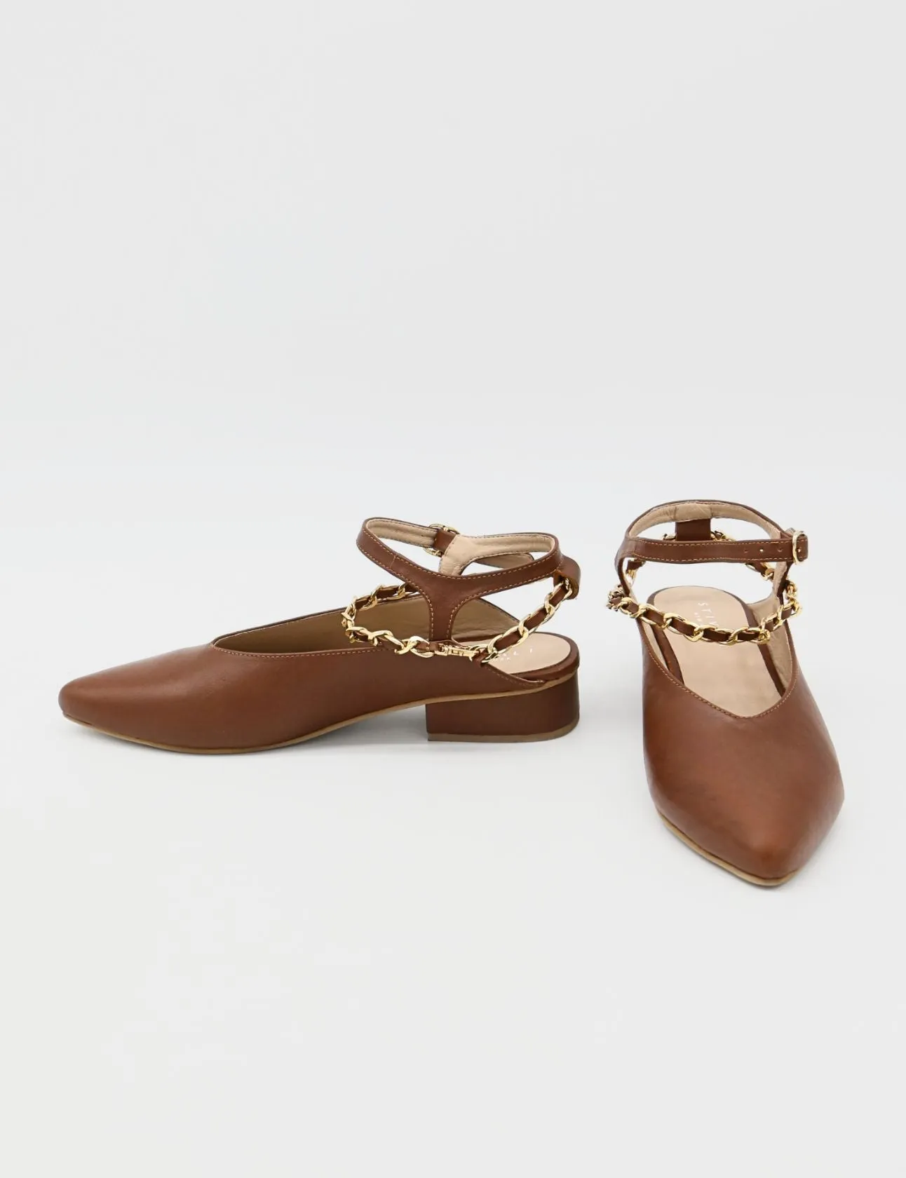 Selene gold chain slip on mule in tan leather