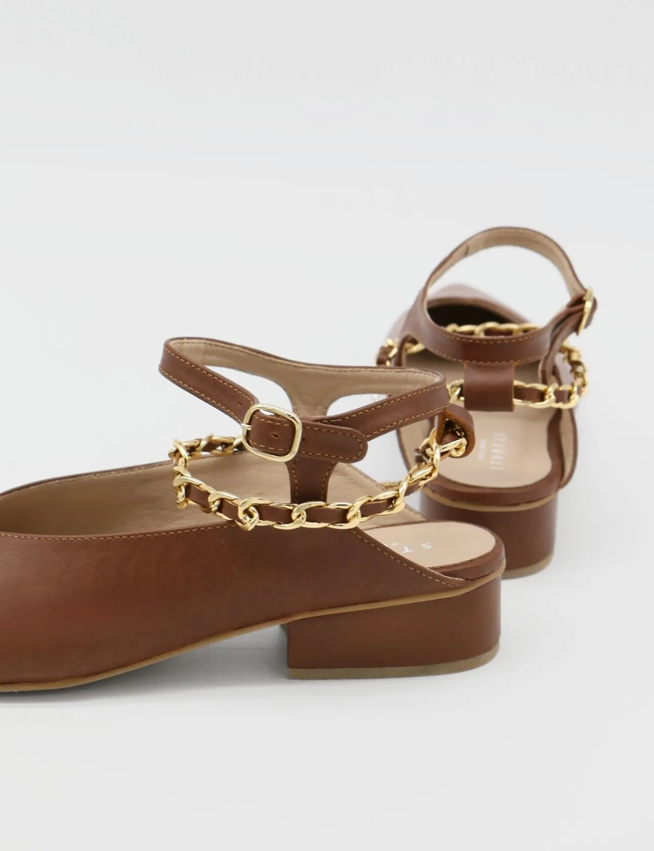 Selene gold chain slip on mule in tan leather